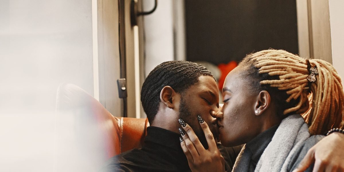 A couple sharing an intense or playful moment, capturing the dynamic and emotional core of a beloved romance novel.