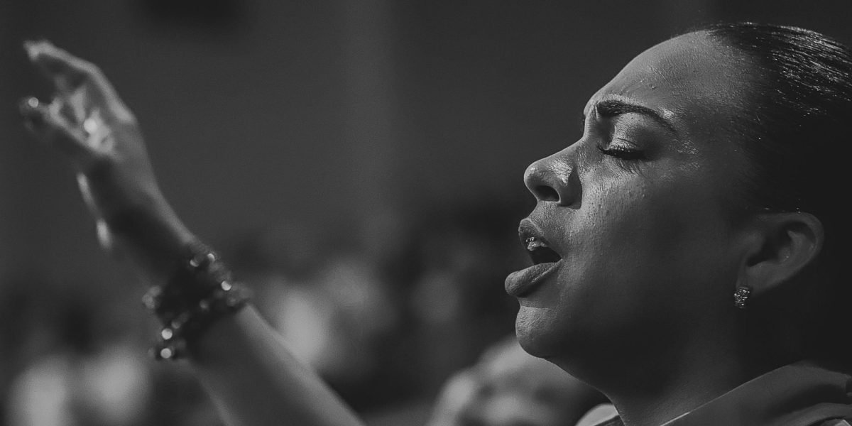 Someone captivating an audience, symbolizing the enduring power of epic storytelling.