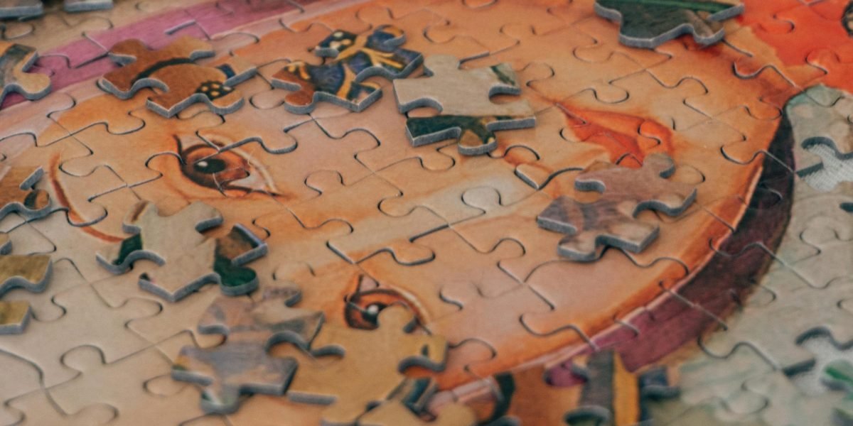 A team actively collaborating on solving a complex problem or puzzle, symbolizing the Maze Runner's challenge.