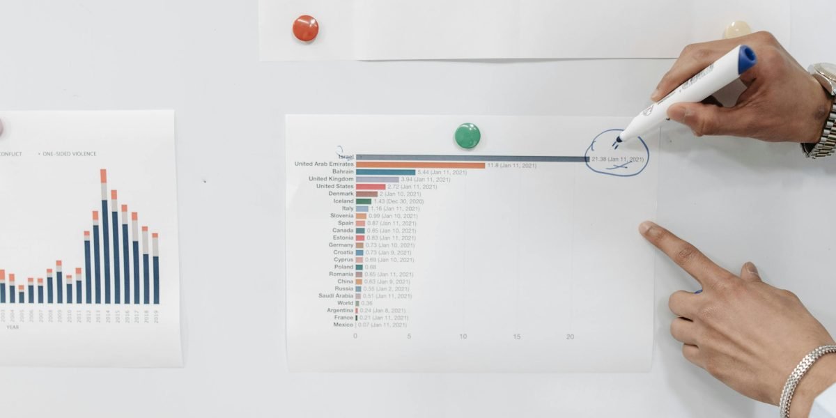 A person organizing information, representing the process of understanding different book discovery methods.