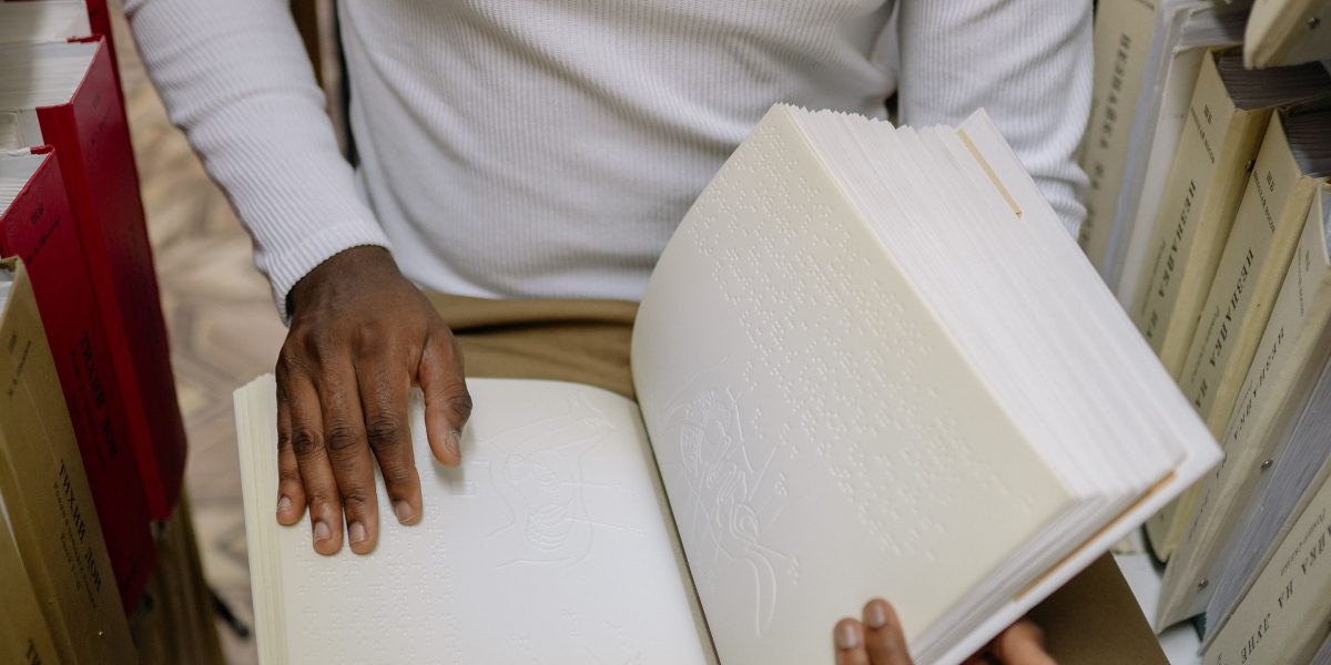 A person delighted by finding a unique or specialized book, reflecting the experience of exploring niche archives.