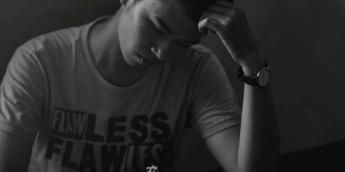 A reader engrossed in a book, reflecting on its deeper meanings.
